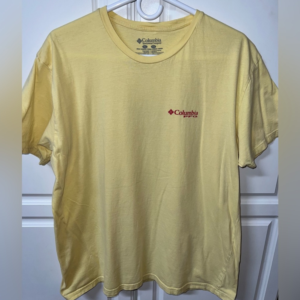 Columbia Cream Tee with Vibrant Logo on Back.
